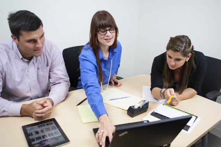 Customers watching a webinar